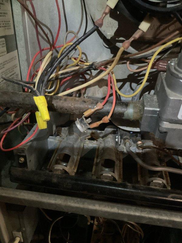 Responded to no-heat call for 30-year-old furnace. Inspection revealed deteriorated control wiring with multiple connection issues. Serviced electrical components, reconnected loose wires, and tested system operation to restore heating function.