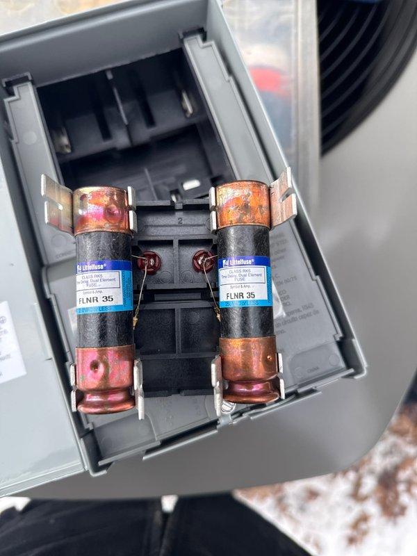 Completed installation of a 90% Furnace and Air Conditioning system. Installed new FLNR 35 fuses in the electrical junction box and mounted a Kidde carbon monoxide detector to ensure proper system safety and code compliance.