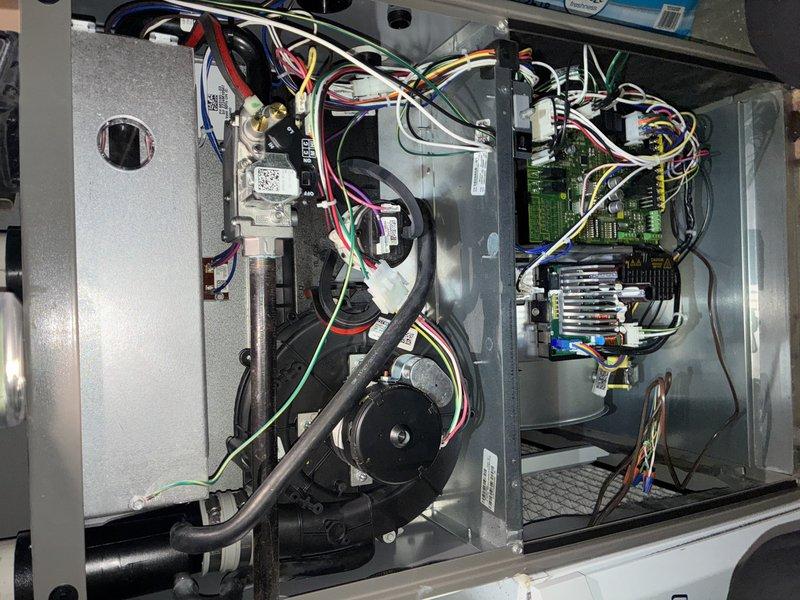 Performed scheduled maintenance on 2-year-old gas furnace (MVP model). Inspected and replaced pleated air filter. Examined interior electrical components including circuit board, wiring harness, and blower assembly, confirming all connections secure and functioning properly. System operating within manufacturer specifications.
