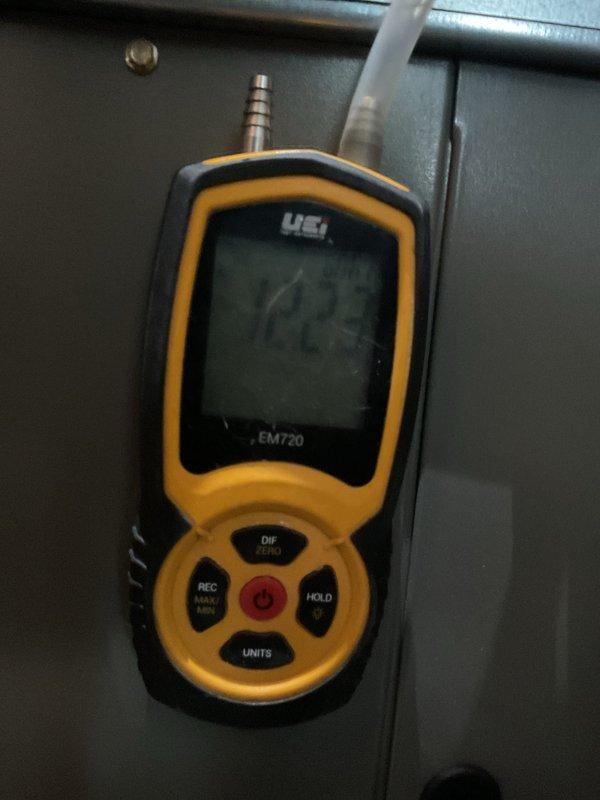 Completed annual heating maintenance service on 1-year-old system. Performed electrical testing using multimeter to verify voltage readings of 3.16V. Conducted pressure and temperature measurements with UEi EM720 meter to ensure system operating within manufacturer specifications. All components functioning properly; system ready for heating season.