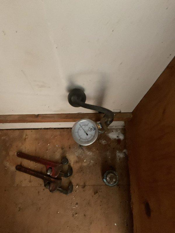 Installed new gas line from existing oil furnace location to accommodate future conversion to natural gas system. Completed gas piping installation with pressure testing as evidenced by gauge verification. All components installed according to code with proper fittings and connections. Gas kit components installed as specified in work order.