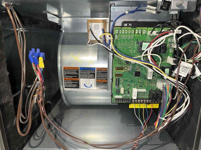 Performed scheduled heating system maintenance service including combustion analysis testing on natural gas system showing optimal efficiency of 96.0% with acceptable O₂ (7.1%), CO₂ (7.8%), and CO (40 ppm) levels. Inspected and verified proper operation of blower motor assembly, circuit board connections, and wiring harness integrity with all components found in good working condition.