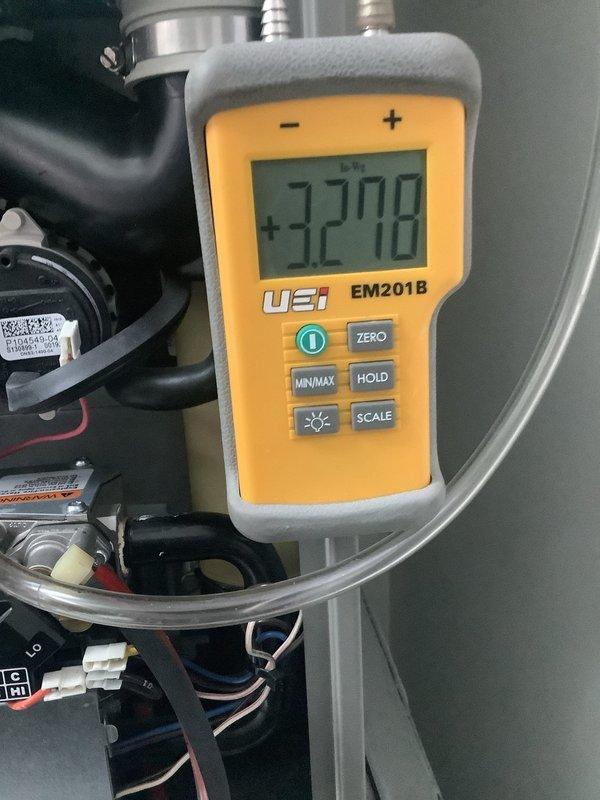 Performed scheduled MVP heating maintenance service (rescheduled from 10/28). Conducted system inspection using UEi EM201B digital measurement device, which recorded a reading of 32.70. Used specialty tools to complete necessary adjustments to heating components and verified proper system operation.