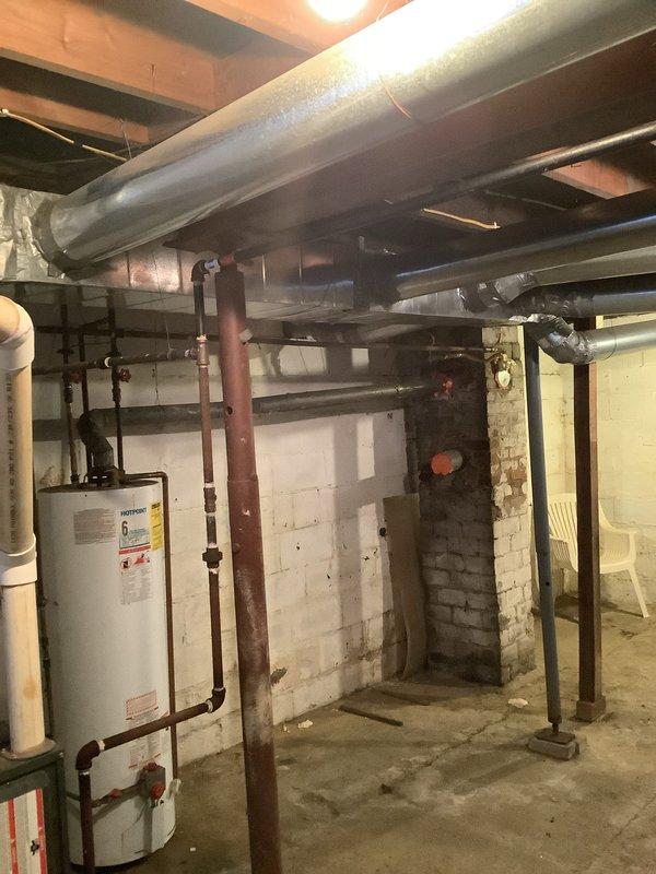 Completed installation of a new HVAC system with significant ductwork modifications in basement mechanical room. Added a new return duct and upsized existing return to improve airflow efficiency, along with installing additional trunk line as specified in work order. All connections properly sealed and tested to ensure optimal system performance.