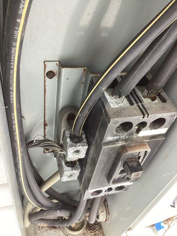 Responded to complete power outage at 40-year-old residence where utility company had identified recurring external breaker trips. Upon inspection, found significant corrosion and debris accumulation in the exterior service panel, along with deteriorated connections. Cleaned panel, replaced corroded components, and secured loose connections to resolve the tripping issue, successfully restoring power and heat to the home.