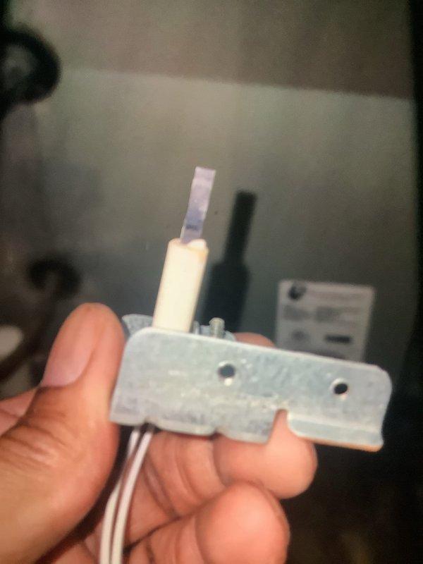 Performed scheduled heating maintenance service on customer's HVAC system. Inspected furnace components including electrical connections and ignition system. Removed and examined igniter assembly, noting normal wear but confirming proper functionality for continued reliable operation.