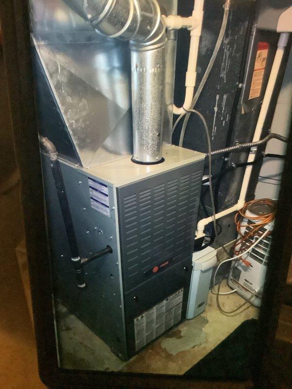 Performed scheduled MVP heating maintenance on 9-year-old system. Inspected furnace unit, ductwork connections, and associated whole-house humidifier. Verified proper operation of control systems including humidifier's digital interface and adjustment mechanisms. All components functioning within normal parameters.