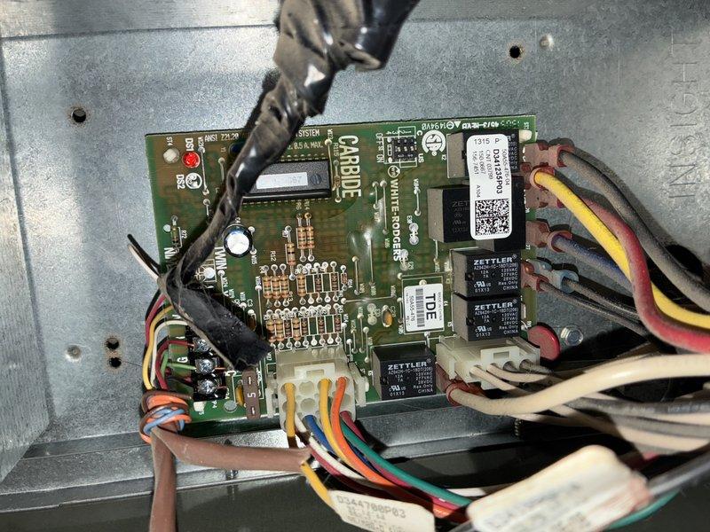 Completed scheduled maintenance on two Carrier furnace units. Inspected circuit board components and connections, confirming proper operation of control systems. Examined and secured ignitor assembly components to ensure reliable heating performance.