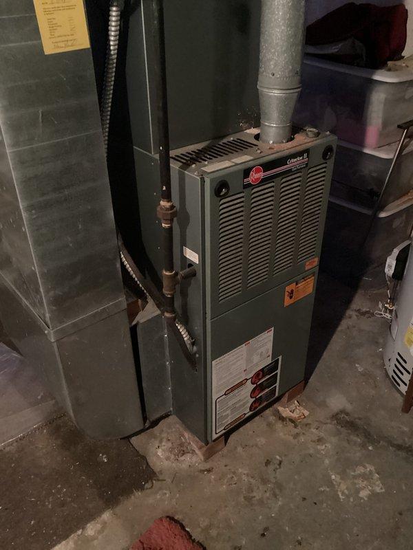 Performed scheduled maintenance on Rheem Criterion II gas furnace. Accessed unit through back side door, completed full inspection and standard preventative maintenance procedures. System is operating within normal parameters.