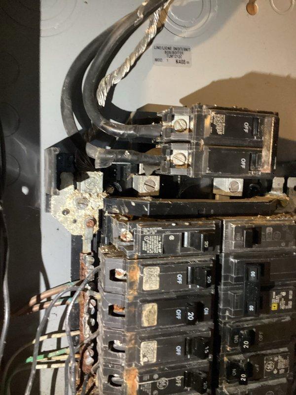 Responded to no-power service call after utility company identified corrosion issues. Inspection of main electrical panel revealed significant corrosion at multiple breaker connection points and oxidation of copper conductors. Cleaned corroded components, tightened loose connections, and restored power. Recommended future panel upgrade due to age-related deterioration.
