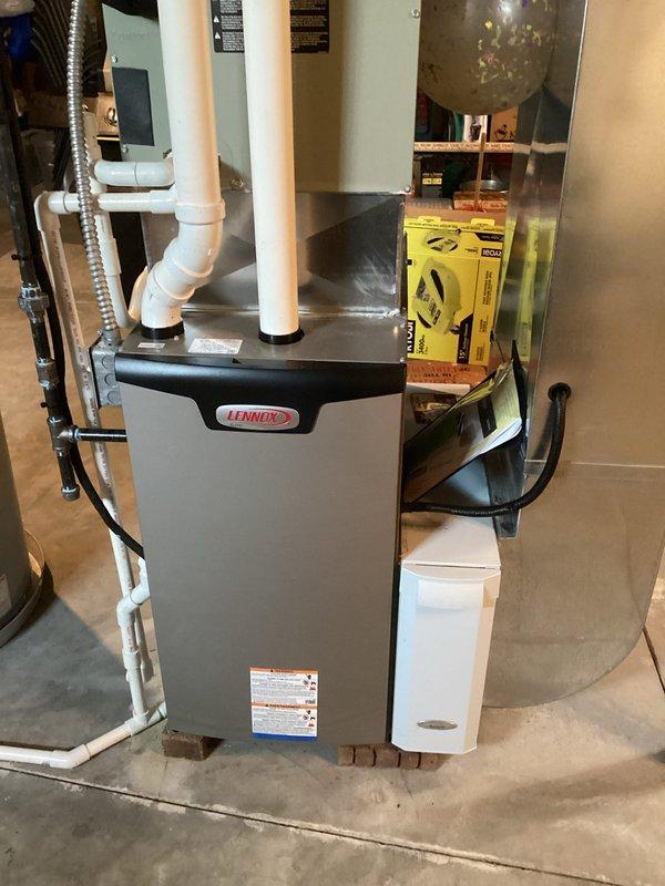 Performed scheduled MVP Heating Visit on Lennox furnace system. Inspected unit including exhaust/intake PVC venting, ductwork connections, and surrounding components - all in good working condition with no signs of damage or leakage. Replaced air filter with new pleated filter to maintain system efficiency and air quality.