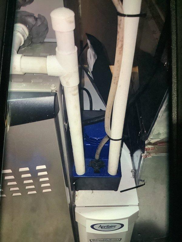 Performed scheduled MVP heating maintenance service. Inspected HVAC system including Aprilaire humidifier and ventilation components. Identified significant frost accumulation on evaporator coils requiring attention, indicating potential issues with the defrost cycle that could affect system efficiency.