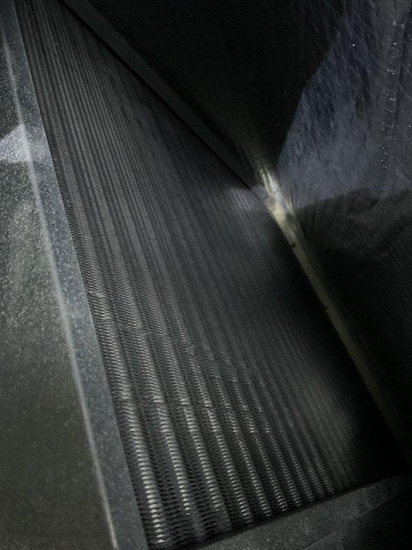 Performed scheduled heating maintenance tune-up on Lennox HVAC system. Inspected blower assembly which showed some dust accumulation and discoloration. Examined cooling coil which appeared darkened, suggesting potential airflow restriction. Evaluated ductwork and recommended professional cleaning to improve system efficiency.