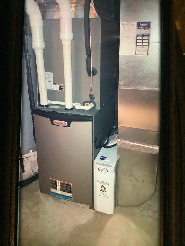 Performed scheduled MVP Heating Visit on Lennox furnace system. Inspected furnace unit, associated PVC exhaust/intake venting, and examined internal control board circuitry. All components found in good working condition with connections intact and system operating properly.