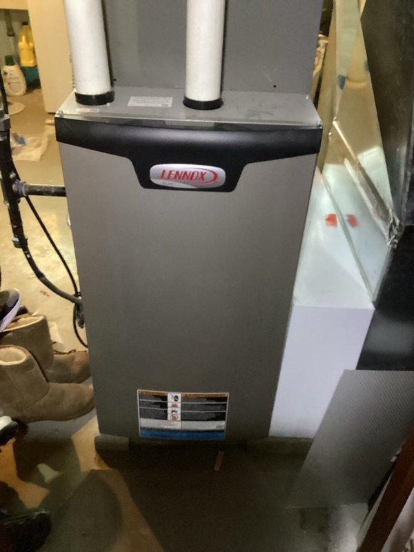 Performed routine preventative maintenance on Lennox furnace system. Inspected the unit including exhaust/intake PVC pipes and examined the air filter which showed normal dust accumulation. All systems functioning properly after MVP service completed.