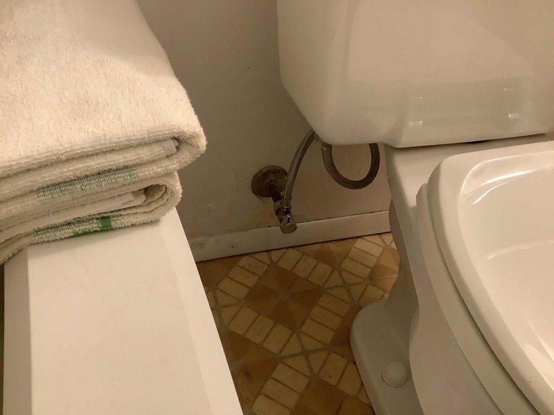 Responded to service call for a bathroom faucet leak. Inspected aging plumbing components under the sink, including corroded drain assembly and water supply valves. Replaced faulty valve components and repaired leaking faucet to restore proper functionality.