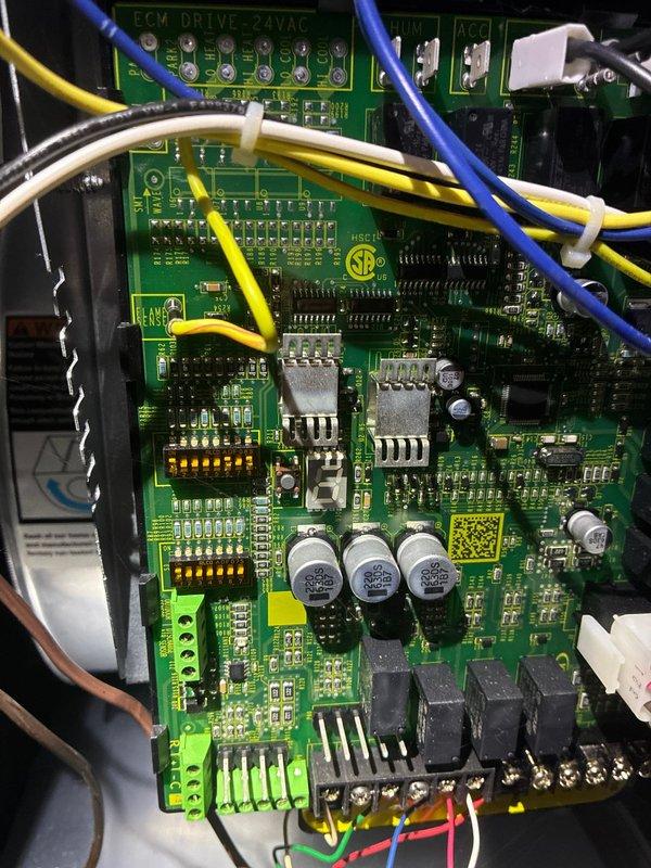 Performed routine maintenance on furnace with focus on ECM drive components. Inspected electronic control board connections and verified proper wire terminations. Used hex tool to adjust and secure components as part of standard tune-up procedure.