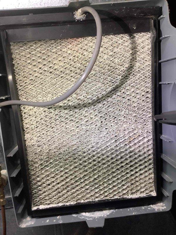Performed scheduled maintenance on MVP furnace. Inspected blower assembly which showed normal dust accumulation on fan blades. Removed and replaced heavily soiled air filter with significant particulate buildup, restoring proper system airflow.