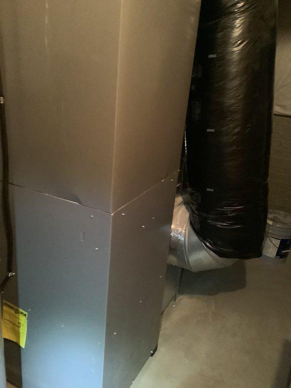 Performed furnace replacement estimate in mechanical room with existing PVC venting system. Assessed current HVAC unit and black insulated ductwork. Documented condition of connections and surrounding utility infrastructure with photos for comprehensive replacement proposal.