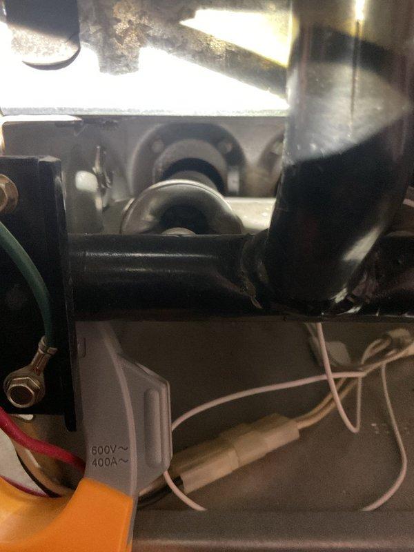 Responded to no-heat call at residential property. Upon inspection, found faulty blower motor assembly causing system failure. Replaced motor, verified proper electrical connections (600V) to control board, and tested system operation. Unit now functioning correctly with proper airflow.