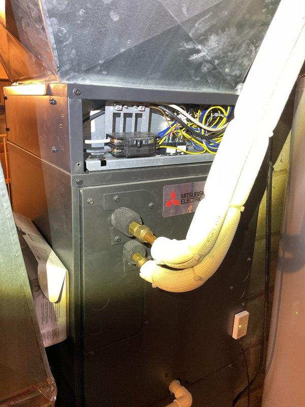 Responded to no-heat service call on 4-year-old Mitsubishi Electric system. Conducted temperature diagnostics using Fieldpiece thermometer, revealing heat exchanger temperature of 96.6°F, significantly below normal operating range. Replaced clogged Aprilaire 413 filter and cleaned internal components, restoring proper airflow and system functionality. System now operating at normal parameters with appropriate heat output.