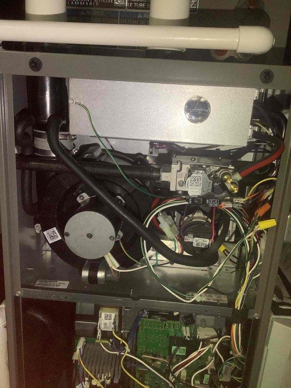 Performed routine maintenance on MVP furnace system. Inspected internal components including blower assembly, circuit board with DIP switches, wiring connections, and gas valve. All components found in normal operating condition with no visible damage or abnormalities.
