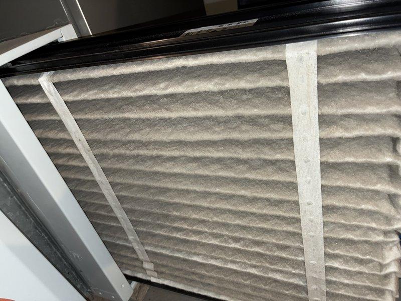 Performed scheduled MVP furnace maintenance service. Inspected residential HVAC system including furnace and associated ductwork. Examined air filter which showed normal accumulation of dust and debris; filter condition indicates regular replacement schedule should be maintained for optimal system performance.