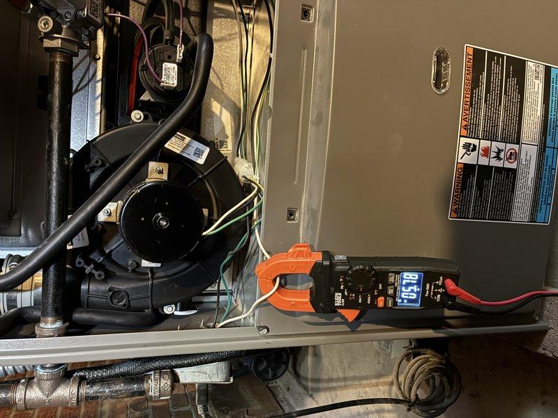 Performed routine maintenance on two furnaces as requested. Conducted comprehensive electrical inspection using clamp meter, confirming proper amperage readings of 40.8 on blower motor. All internal components, control board connections, and wiring were examined and found to be in proper working condition.