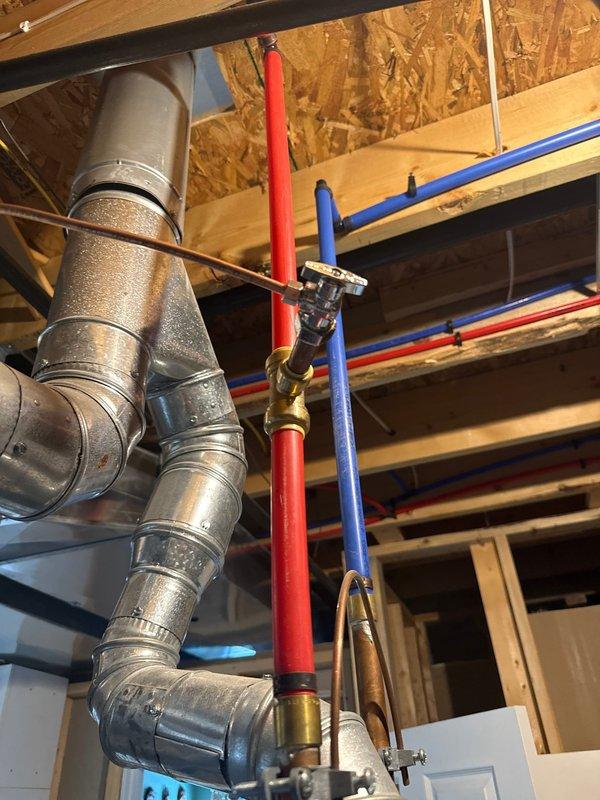 Successfully installed an AprilAire 600 humidifier system on the existing HVAC unit in an unfinished basement area. Mounted the humidifier housing to the ductwork, connected water supply lines with appropriate valves, and ensured proper integration with the existing ventilation system. All connections were secured and system functionality was verified upon completion.