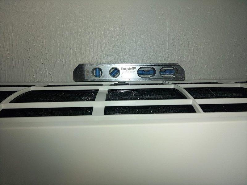 Installed 1-1 minisplit system in garage. Verified proper leveling of the interior unit using spirit level and installed appropriate electrical protection with 15A FLNR and ECNR fuses. FAMOUS parts were sourced and on hand for installation.
