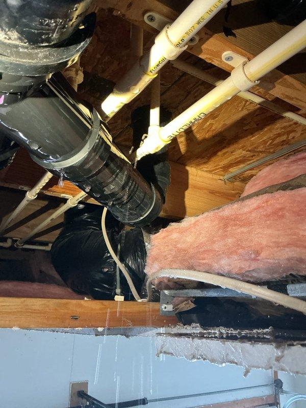 Responded to emergency call for burst pipe leaking through ceiling in 18-year-old residence. Upon inspection, identified water damage in textured ceiling requiring access hole creation. Repaired damaged PVC supply line in attic space, ensuring proper connections to existing plumbing system and verifying no additional leaks before completing service.