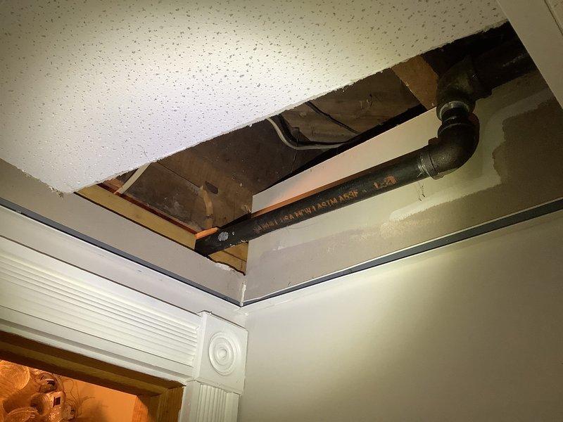 Responded to customer call regarding gas line access needs. Upon inspection, accessed plumbing infrastructure through ceiling and wall cavities to examine cast iron piping and gas line components. Inspected connections, elbow joints, and overall system integrity. No parts required for this service call.