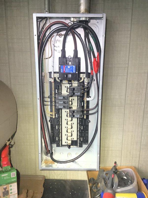 Completed comprehensive electrical service upgrade by replacing three panels throughout the home (garage, laundry room, and upstairs), including reusing existing wiring with proper bonding bushings for adequate grounding. Additionally installed a whole home surge protector and trenched power to the septic crock from the new disconnect combo, with AFCI/GFCI breakers installed where required per code.
