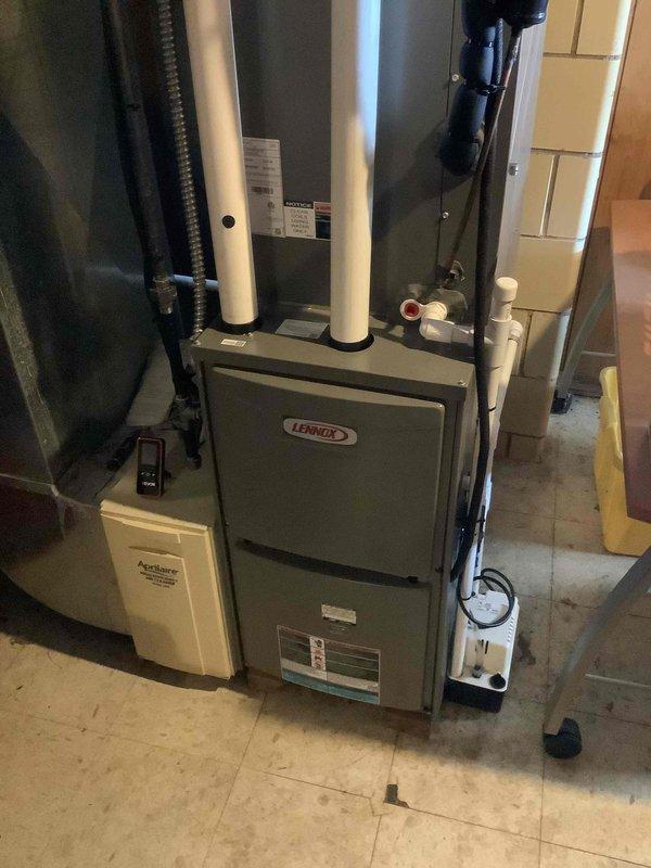 Performed comprehensive tune-up service on Lennox furnace system with attached Aprilaire humidifier. Inspected and cleaned blower assembly, confirming proper operation with no signs of wear or damage. All components functioning within normal parameters.