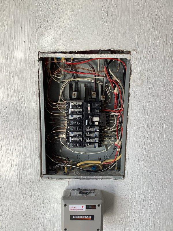 Installed dedicated electrical circuit for mini-split system. Accessed breaker panel to add new circuit breaker and ran necessary wiring through attic space, navigating around existing insulation. Successfully connected to Generac transfer switch to ensure proper power distribution and functionality.