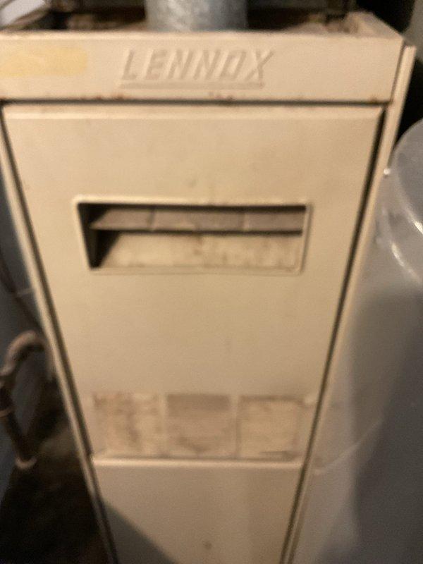 Responded to no-heat service call for 20-year-old Lennox furnace. Upon inspection, found system operational with proper flame pattern at burner assembly, showing normal blue flames with orange tips. Tested gas valve functionality and verified all components of the heating system were working correctly. Customer advised about age-related concerns and recommended considering replacement options in near future due to system's advanced age.