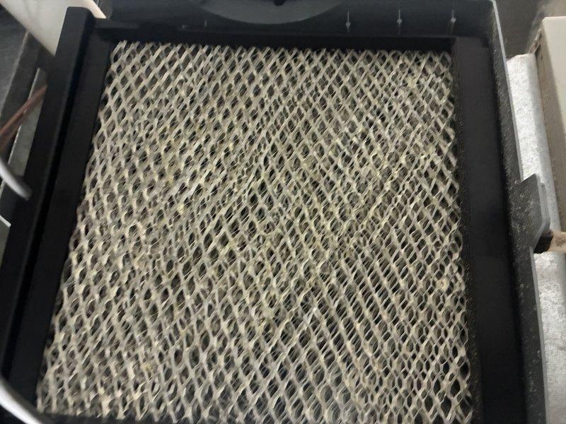 Performed routine maintenance on 3-year-old gas furnace (MVP model). Inspected and documented condition of air filter showing significant dust accumulation requiring replacement. Examined ventilation components including grille assembly which displayed minor dust buildup on horizontal slats.