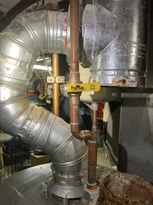 Replaced leaking Rheem 40-gallon water heater with new Bradford White 40-gallon unit including installation of new cold water shut-off valve, expansion tank, and humidifier tee with shut-off valve. Additionally, installed new sump pump with check valve and necessary piping after confirming original unit was non-operational.