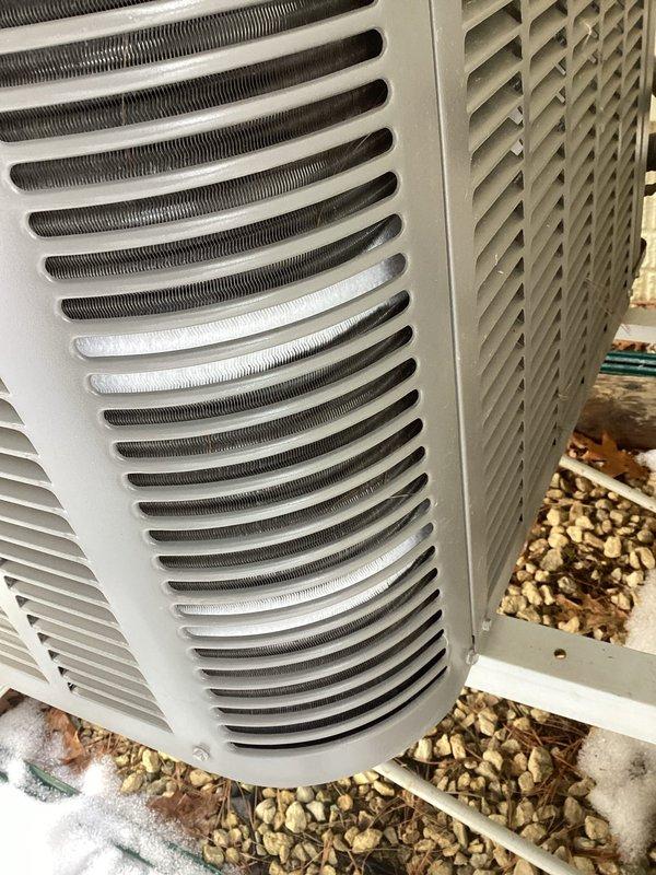 Diagnosed heat pump experiencing 5-minute short cycling delay. Inspected outdoor condenser unit and internal control board, noting normal coil condition with no visible frost or damage. Verified electrical connections were secure with proper wire routing to all components.