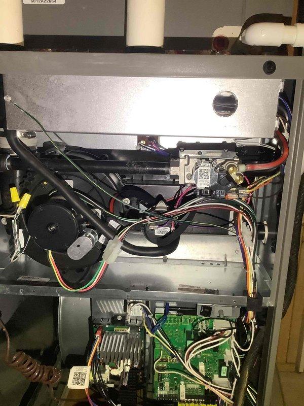Performed scheduled maintenance on HVAC system (MVP Heating Visit). Inspected and evaluated furnace components including circuit board, electrical connections, and blower motor. All components functioning properly with no visible damage or deterioration noted. System is operating within normal parameters.