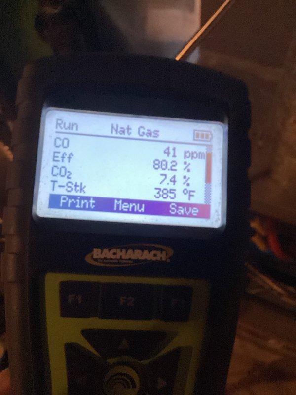 Performed standard tune-up on 6-year-old furnace. Inspected gas line connections and plumbing components for proper installation and signs of wear. Conducted combustion analysis with Bacharach analyzer showing 80.2% efficiency, 41ppm CO, 7.4% CO2, and stack temperature of 385°F, indicating acceptable but not optimal performance.