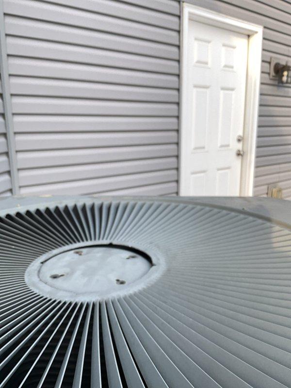 Responded to service call for 5-year-old Lennox heat pump that was blowing cold air during heating mode. Inspected outdoor unit and found system operating in defrost mode due to winter conditions. Verified refrigerant pressures and electrical connections were within normal parameters. Restored proper heating operation by resetting system and confirmed normal operation through complete heating cycle.