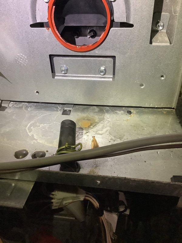 Performed scheduled furnace preventative maintenance. Inspected heat exchanger and air handling components, noting dust accumulation on evaporator coil. Observed minor water damage/corrosion at unit base requiring future monitoring. System operational with MVP service completed.