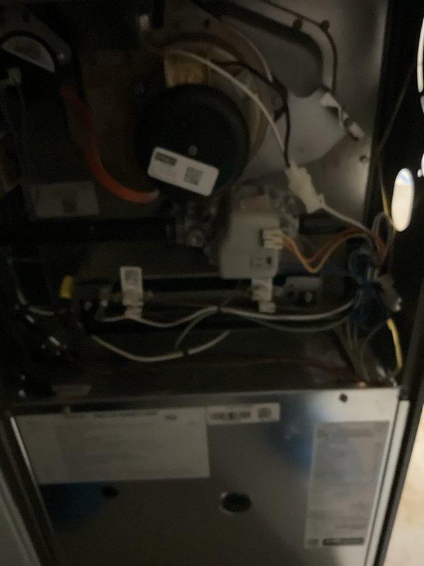 Responded to no-heat complaint for furnace showing intermittent operation. Upon inspection, identified loose electrical connections at the blower motor and control board. Cleaned dust accumulation from internal components, secured all wiring connections, and verified proper electrical continuity. System now functioning properly with consistent operation.