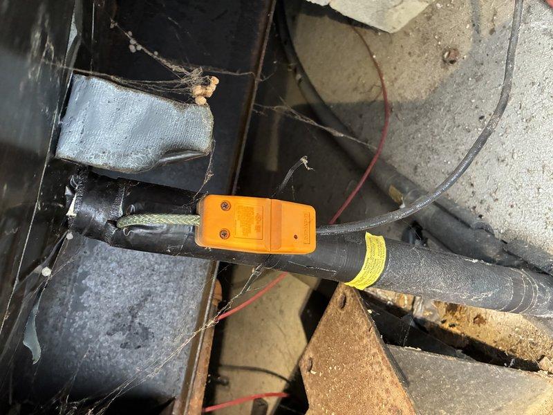 Performed diagnostic inspection of heat tape system under mobile home. Located and tested existing heat tape installation using thermal sensing equipment. Observed significant dust accumulation on blower assembly components. System was operational but recommended routine maintenance to improve efficiency and ensure continued functionality through winter months.