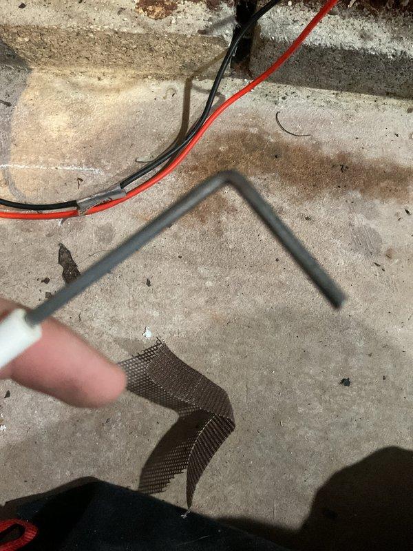 Performed scheduled furnace tune-up service as confirmed. Conducted electrical testing with multimeter showing 502 ohms reading on component. Discovered damaged/corroded mesh screen in heating system which was inspected and documented.