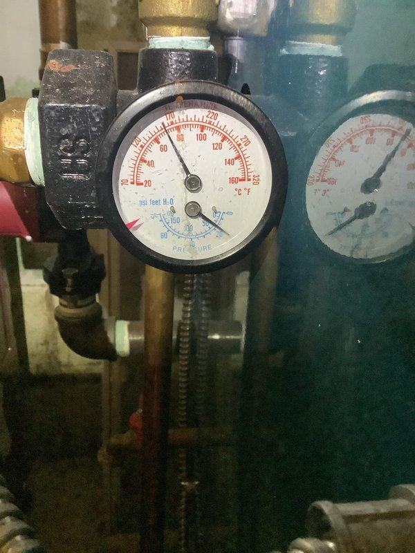 Performed scheduled MVP furnace maintenance visit (rolled from 01/23). Inspected circulator pump operation, verified proper pressure readings on system gauges, and confirmed normal function of heating system components. Pump display showed normal operating parameters with 3.0 reading on digital display.