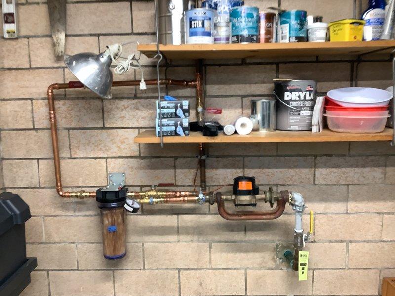 Responded to service call for a 4-month-old hot water tank leaking from the relief valve. Inspected system and confirmed overflow valve malfunction. Replaced faulty temperature and pressure relief valve, tested water pressure (verified within normal operating range), and confirmed proper system operation with no further leaks.
