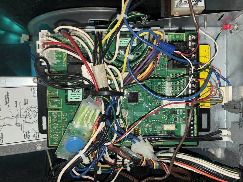 Performed scheduled BS-MVP heating maintenance service. Inspected electronic control board and connections, noting proper wire harness organization and circuit board functionality. Used hex tool to check/tighten component fasteners as part of preventive maintenance protocol.