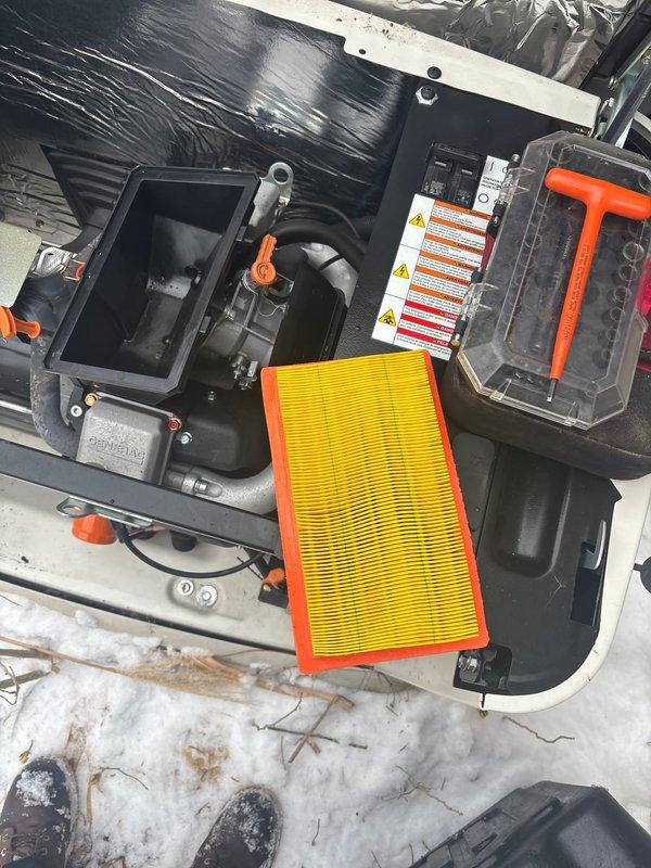 Performed routine maintenance on 2-year-old 22kW Generac generator. Replaced air filter and conducted battery diagnostic test. Battery test confirmed good condition with 98% health (SOH), 100% charge (SOC), and 13.01V reading.